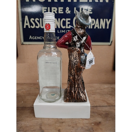 105 - Jim Beam Kentucky Bourbon ceramic advertising bottle holder in the form of a Cowboy and bottle. {34 ... 