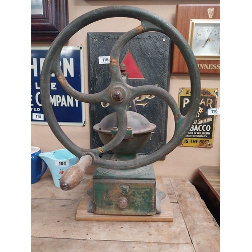 106 - 19th C. cast iron and wooden coffee grinder. {51 cm H x 24 cm W x 31 cm W}.150