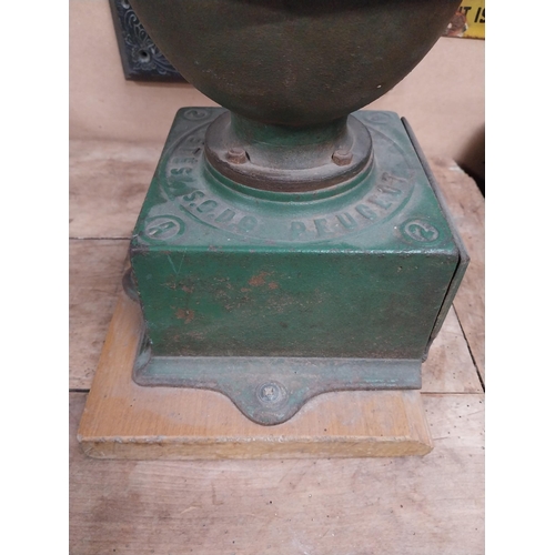 106 - 19th C. cast iron and wooden coffee grinder. {51 cm H x 24 cm W x 31 cm W}.150