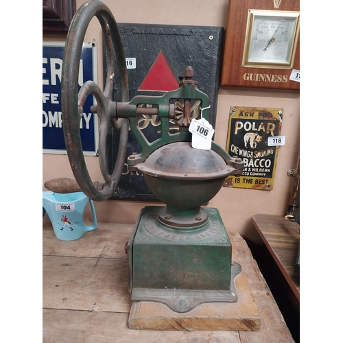 106 - 19th C. cast iron and wooden coffee grinder. {51 cm H x 24 cm W x 31 cm W}.150