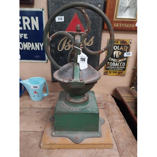 106 - 19th C. cast iron and wooden coffee grinder. {51 cm H x 24 cm W x 31 cm W}.150