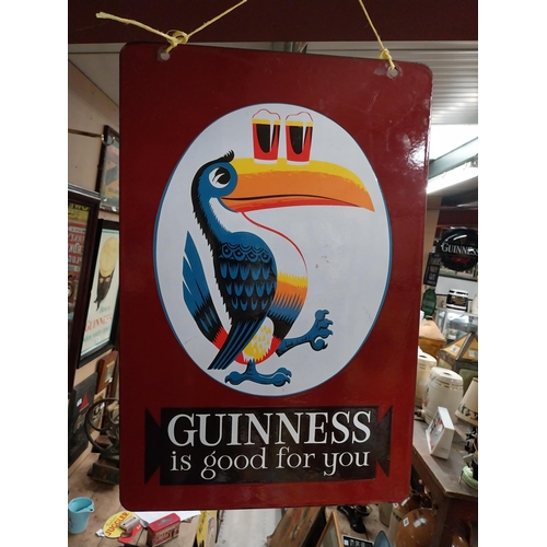 107 - Guinness is Good For You enamel double sided advertising sign. {60 cm H x 40 cm W}.