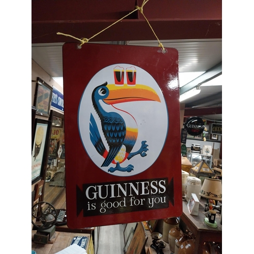 107 - Guinness is Good For You enamel double sided advertising sign. {60 cm H x 40 cm W}.