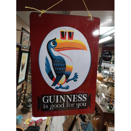 107 - Guinness is Good For You enamel double sided advertising sign. {60 cm H x 40 cm W}.