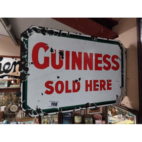 108 - Guinness Sold Here double sided enamel advertising sign. {21 cm H x 47 cm W}