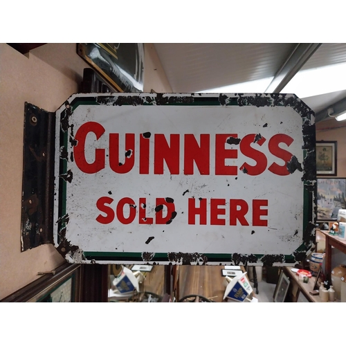 108 - Guinness Sold Here double sided enamel advertising sign. {21 cm H x 47 cm W}