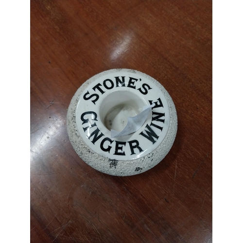 1083 - 19th C. Stone's Ginger Wine ceramic match strike. {5 cm H x 10 cm Dia.}.