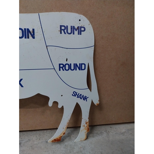 589 - Tin plate Butchers advertisement in the form of a Cow. {23 cm H x 49 cm W}.