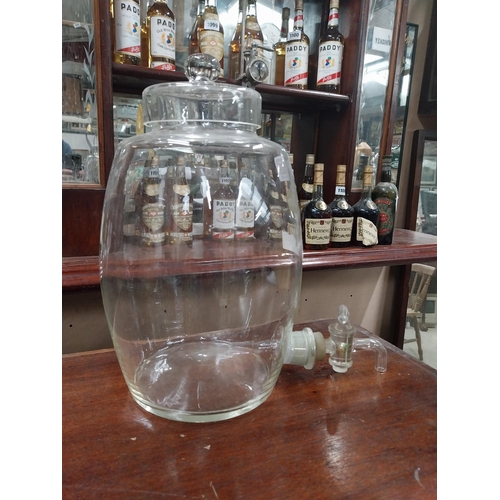 1086 - Early 20th C. glass whiskey dispenser. {34 cm H x 20 cm W x 30 cm W}.