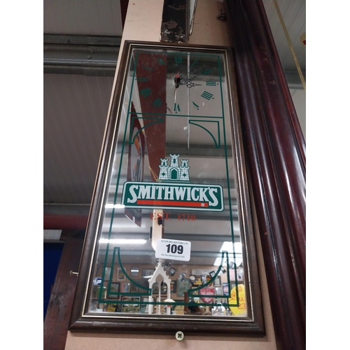 109 - Smithwick's advertising clock {54 cm H X 23 cm W}.