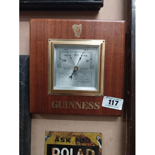 117 - Guinness mahogany Barometer. {23 cm H x 23 cm W}.