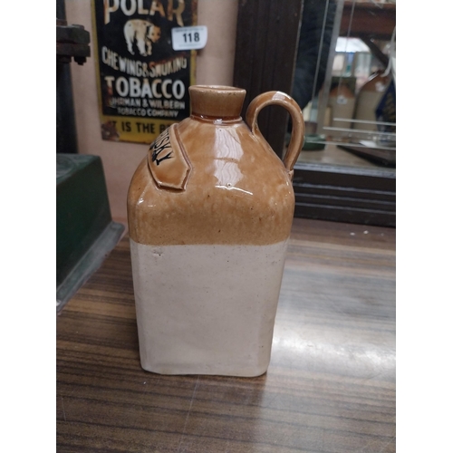 121 - Irish Whiskey stoneware Flagon. {28 cm H x 10 cm W x 10 cm D}.