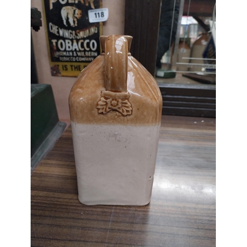 121 - Irish Whiskey stoneware Flagon. {28 cm H x 10 cm W x 10 cm D}.