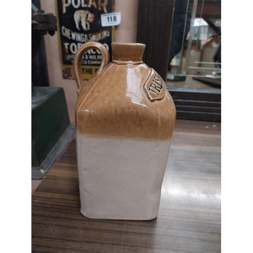 121 - Irish Whiskey stoneware Flagon. {28 cm H x 10 cm W x 10 cm D}.