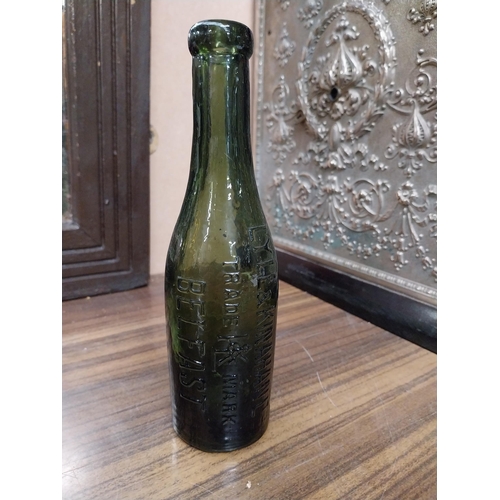 130 - Wheeler and Co Belfast, Lyle and Kinahan Belfast and Coughlan and Co Macroom embossed glass bottles.... 