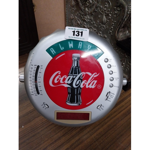 131 - Coca Cola radio in form of bottle top. {5 cm H x 24 cm Diam}