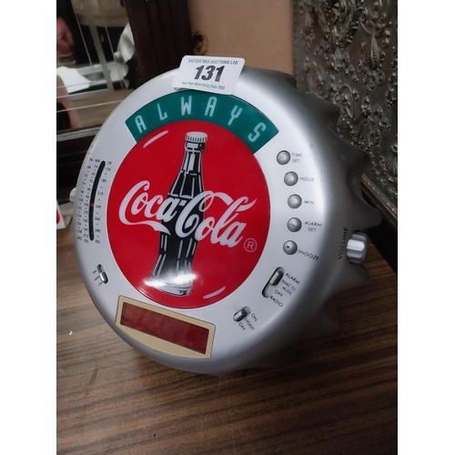 131 - Coca Cola radio in form of bottle top. {5 cm H x 24 cm Diam}