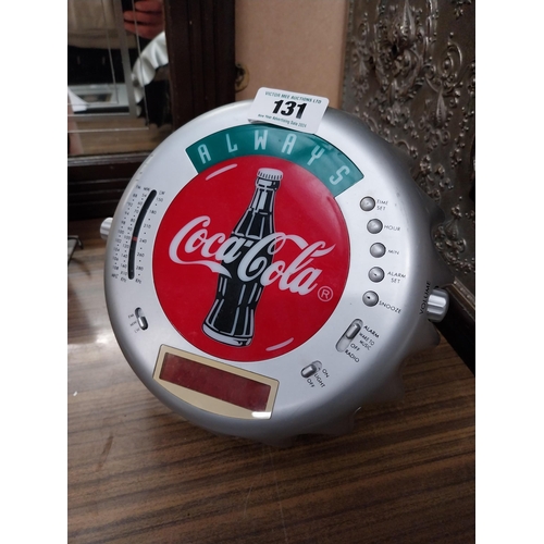 131 - Coca Cola radio in form of bottle top. {5 cm H x 24 cm Diam}