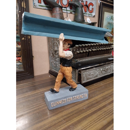 136 - Guinness For Strength Girder Man resin advertising figure. {33 cm H x 34 cm W x 14 cm D}.