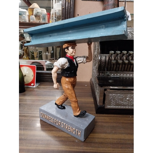 136 - Guinness For Strength Girder Man resin advertising figure. {33 cm H x 34 cm W x 14 cm D}.