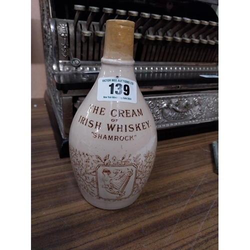 139 - Shamrock Cream Irish Whiskey stoneware flagon. {32cm H x 11 cm Dia.}.