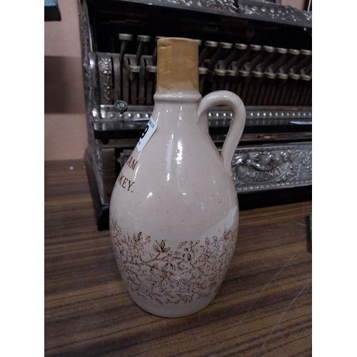 139 - Shamrock Cream Irish Whiskey stoneware flagon. {32cm H x 11 cm Dia.}.