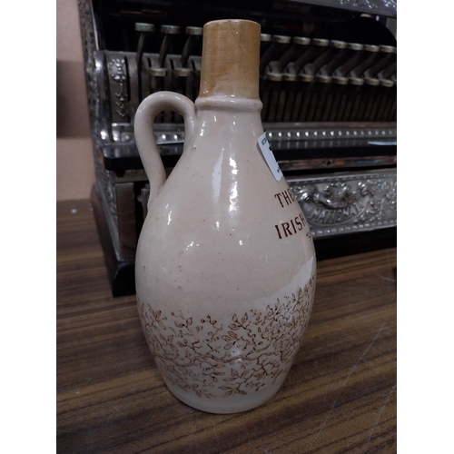 139 - Shamrock Cream Irish Whiskey stoneware flagon. {32cm H x 11 cm Dia.}.