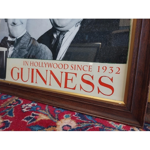 155A - Guinness Laurel and Hardy advertising print mounted in oak frame {47 cm H x 57 cm W }.