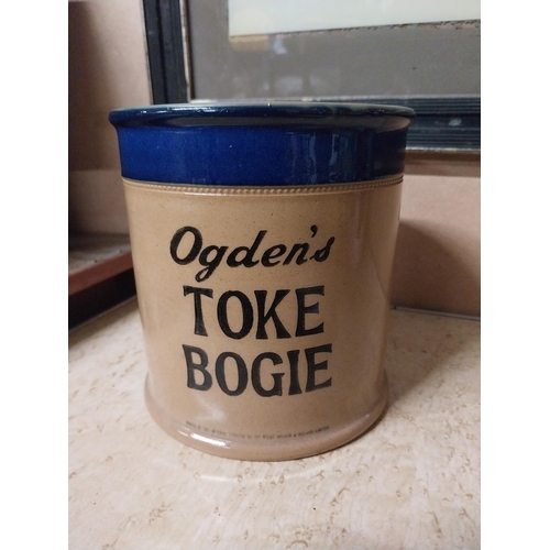 158 - Ogden's Toke Bogie stoneware tobacco jar. {16 cm H x 15 cm Dia.}