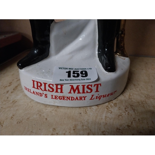 159 - Irish Mist ceramic advertising figure. {30 cm H x 15 cm Dia.}.