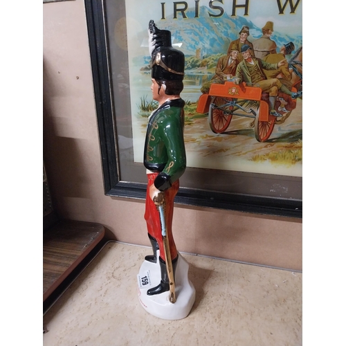 159 - Irish Mist ceramic advertising figure. {30 cm H x 15 cm Dia.}.