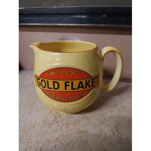 161 - Wills's Gold Flake ceramic advertising water jug. {11 cm H x 16 cm W x 12 cm D}.