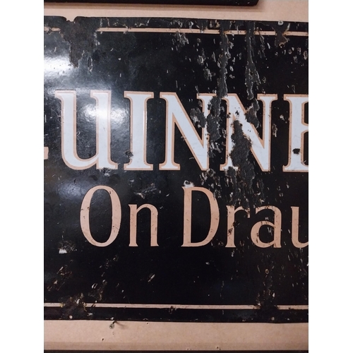 165 - Original Guinness on Draught enamel advertising sign. {45 cm H x 91 cm W}.