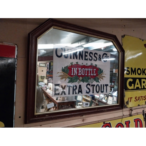 188 - Guinness Extra Stout In Bottle framed advertising mirror. {55 cm H x 68 cm W}.