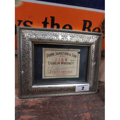 2 - Framed John Jameson advertising label. {20 cm H x 26 cm D}.