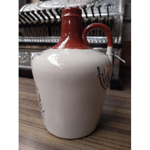 201 - Kilbeggan Irish Whiskey stoneware flagon. {19 cm H x 12 cm Dia.}.