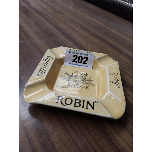 202 - Robin Cigarettes ceramic advertising ashtray. {12 cm H x 11 cm Dia.}.