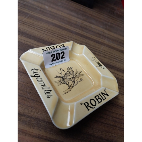 202 - Robin Cigarettes ceramic advertising ashtray. {12 cm H x 11 cm Dia.}.