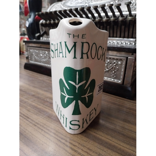 203 - Shamrock Whiskey ceramic advertising water jug. {18 cm H x 17 cm W x 11 cm D}.