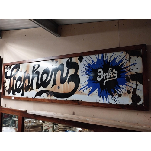 21 - Stephen's Ink enamel advertising sign in wooden frame. {61 cm H x 210 cm W}.