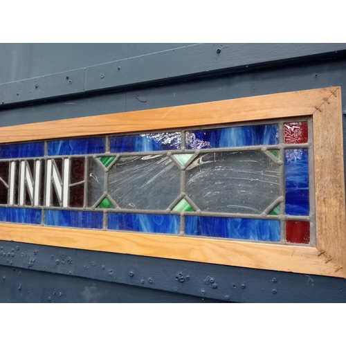 217A - Leaded stain glass THE INN {H 24cm x W 136cm }.