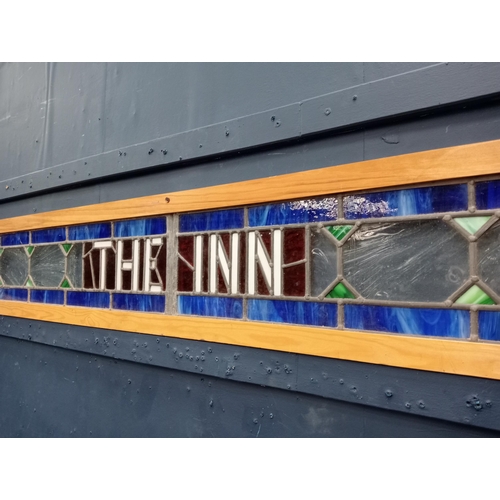 217A - Leaded stain glass THE INN {H 24cm x W 136cm }.