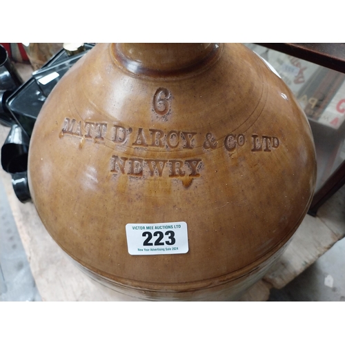 223 - Matt Darcy and Co Newry six gallon stoneware flagon. {57 cm H x 30 cm Dia.}.