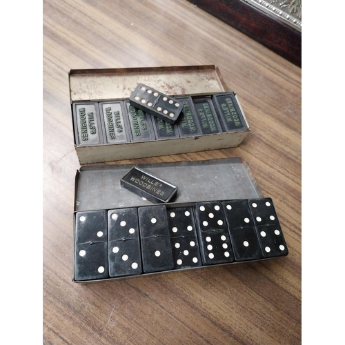 231 - Two Wills's Woodbine advertising Domino sets. {3 cm H x 16 cm W x 5 cm D}.