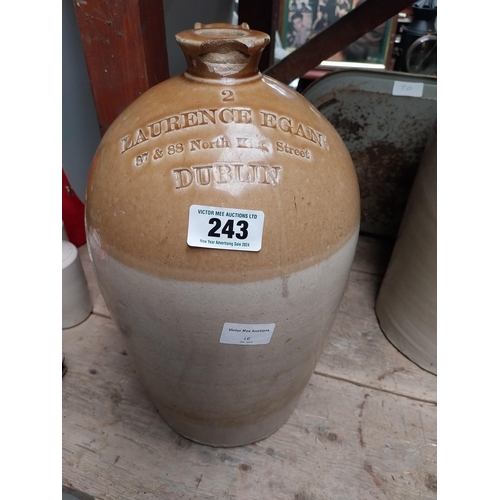 243 - L Egan North King Street Dublin Two gallon stoneware whiskey flagon. {49 cm H x 32 cm Dia.}.