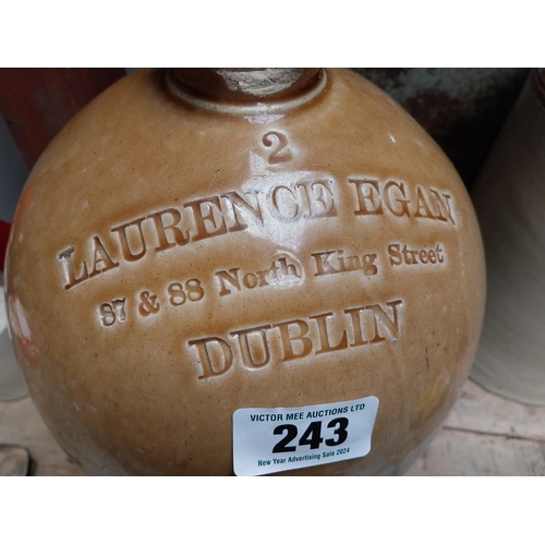 243 - L Egan North King Street Dublin Two gallon stoneware whiskey flagon. {49 cm H x 32 cm Dia.}.