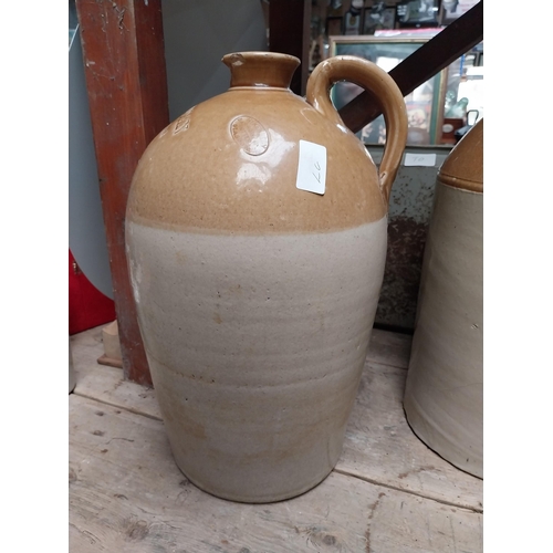 243 - L Egan North King Street Dublin Two gallon stoneware whiskey flagon. {49 cm H x 32 cm Dia.}.