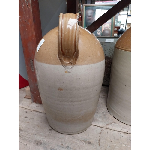 243 - L Egan North King Street Dublin Two gallon stoneware whiskey flagon. {49 cm H x 32 cm Dia.}.