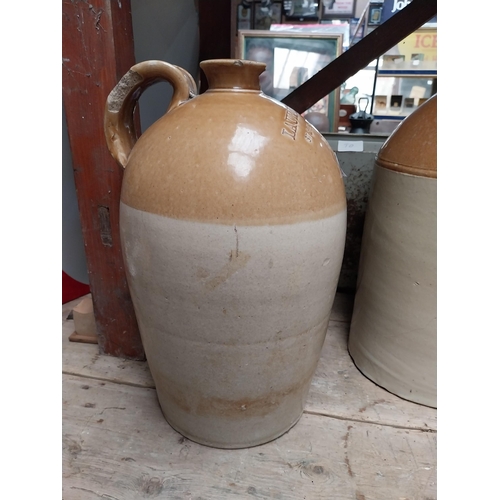 243 - L Egan North King Street Dublin Two gallon stoneware whiskey flagon. {49 cm H x 32 cm Dia.}.