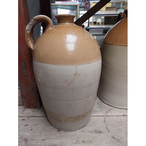 243 - L Egan North King Street Dublin Two gallon stoneware whiskey flagon. {49 cm H x 32 cm Dia.}.